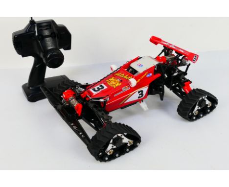 Tamiya - An unboxed, constructed and unusual Tamiya 1:10 scale electric RC 4WD Hotshot Buggy with track set. The model appear