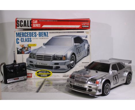 Kyosho - A boxed Kyosho 1:10 scale nitro RC Mercedes Benz C Class DTM Version. The assembled model bears a swing label to the