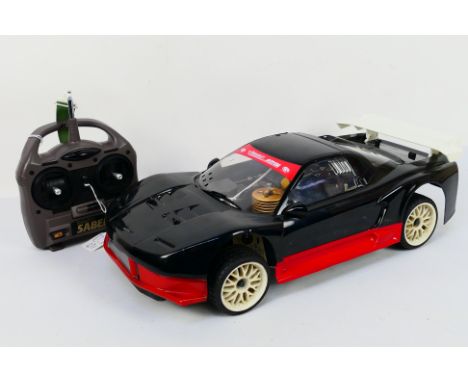 Kyosho - An unboxed Kyosho 1:10 scale nitro 4WD RC SV Rally Honda NSX. The model shows some signs of use and appears to be in