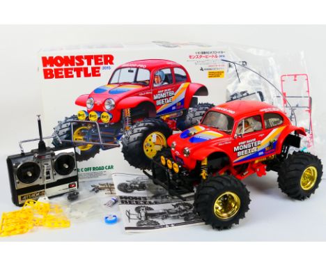 Tamiya - A boxed and constructed vintage Tamiya #58618 1:10 scale electric RC 'Monster Beetle' . The kit has been built to an