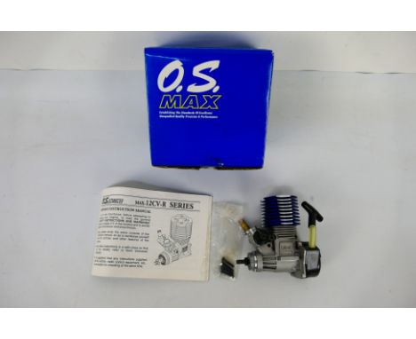 OS Engine - A boxed OS Engines #11297 Max-12CV-R nitro engine. The engine appears Mint, with instructions, housed in a Very G