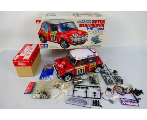 Tamiya - A constructed Tamiya 58163 1:10 electric RC FWD Racing Car 'Rover Mini Cooper' '94 Monte Carlo. The model appears to