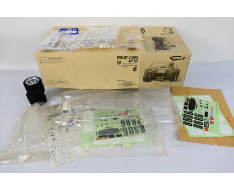 Kyosho - A boxed Kyosho 39611 1:8.8 scale Shelby Cobra 427 S/C RC 'Nostalgic Car Series' BODY SET 2. The set contains clear b