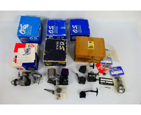 OS Engine - Three OS Engines (two boxed) with three EMPTY OS Engine boxes. Lot contains an OS #11320 Max 10 FP-B with Kyosho 