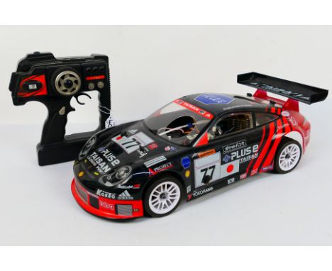 Kyosho - An unboxed Kyosho 1:10 scale nitro PureTen GP Spider MkII World Cup Edition chassis with Taisan Porsche 911 Starcard