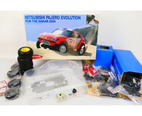 Kyosho - A boxed Kyosho 31033 1:10 scale nitro RC .15 engine powered 4WD QRC Series Mitsubishi Pajero Evolution For The Dakar