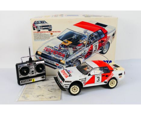 Tamiya - A boxed and constructed vintage Tamiya #58064 1:12 scale electric RC Toyota Celica Gr.B Rally Special. The kit has b