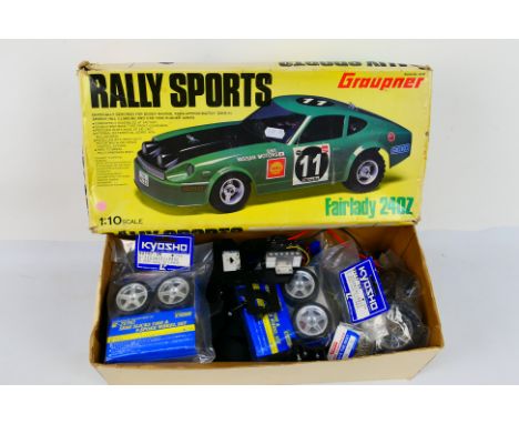 Kyosho - Other - A group of mainly loose predominately Kyosho RC car parts. Lot includes Kyosho #92757 K-Zero Semi Slicks tyr