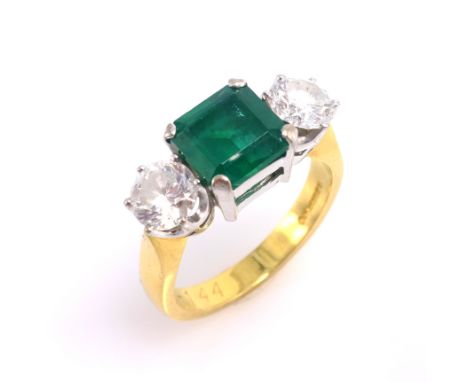 Emerald and diamond three stone gold ring, hallmarked 18ct emerald approx 2 carat, each diamond 0.6 carat maker's mark EF Lon