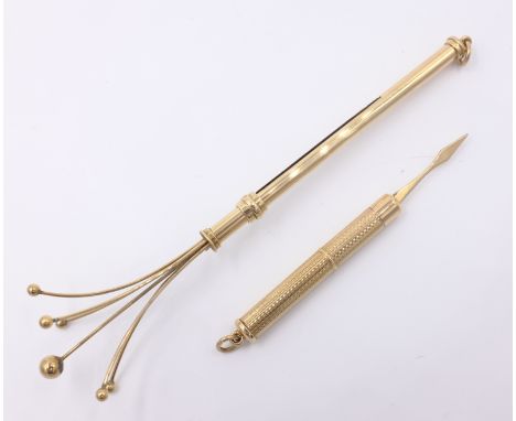 Gold engine turned toothpick, gold swizzle stick both hallmarked 9ct Condition Report tooth pick approx 5.6 gm swizzle stick 