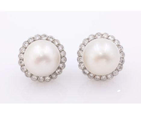 Pair of 18ct white gold South Sea pearl and diamond cluster stud ear-rings, each set with pearl 11mm, and twenty diamonds hal