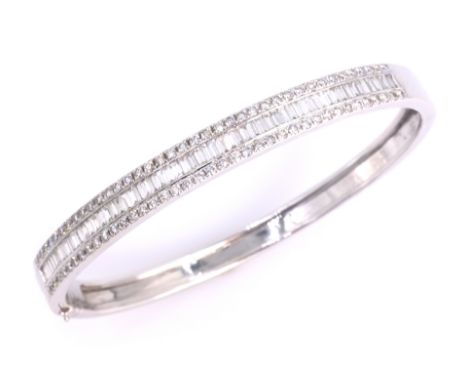 Mappin & Webb 18ct white gold diamond hinged bangle, set with central baguette diamonds and grain set diamonds to either side