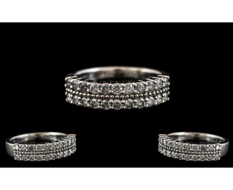 18ct White Gold Attractive Diamond Set Half - Eternity Ring. Full Hallmark for 750 - 18ct. The Round Brilliant Cut Diamonds o