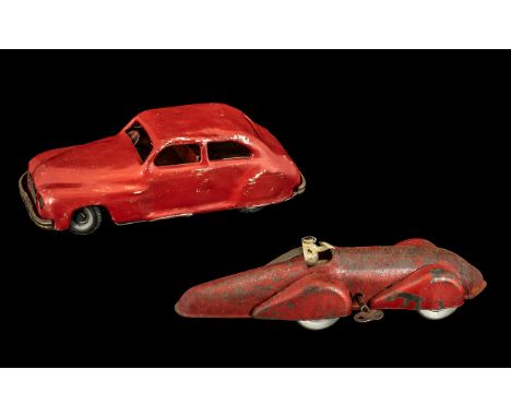 Unusual Key Wind Tinplate Vintage Racing Car with driver in red livery; no maker's marks, 10 inches (25cms) long, with a red 