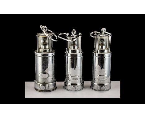 Three Rare Chrome Plated Miniature Souvenir 'Oldham Miners' Safety Lamps, battery operated, model H type, c1930s, 5 inches (1