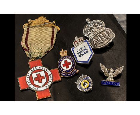 Collection of WWII and Red Cross Badges, comprising small silver 10 year's service badge ARP WWII; WWII Silver ARP badge; sil