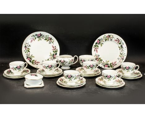 Wedgwood Bone Chine Tea Service 'Hathaway Rose', comprising six trios of teacup, saucer and sandwich/cake plate; two large sa