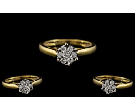 18ct Gold Attractive Diamond Set Cluster Ring. Fully Hallmarked for 18ct to Interior of Shank. The 7 Diamonds of Excellent Co