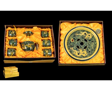 Unusual Boxed Chinese Tea Set, in presentation boxes, comprising a porcelain tray with apertures to place the tea set in a ta