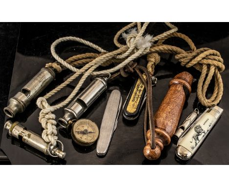 Miscellaneous Lot of Whistles etc. comprising ARP (Hudson &amp; Co) 'The Acme', two Scout whistles, wooden whistle, compass a