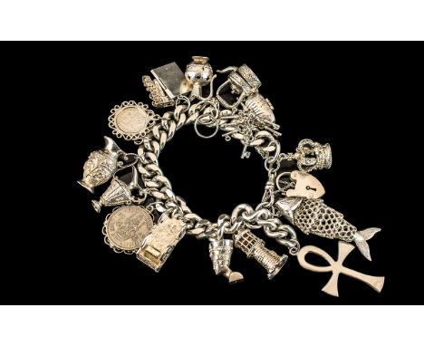 A Superb Vintage - Impressive Sterling Silver Charm Bracelet Loaded with 19 Excellent Silver Charms - Some Expensive and Larg