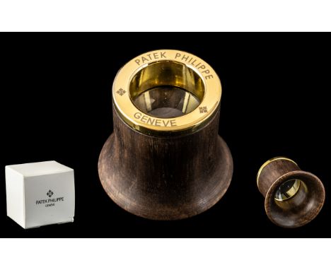 Patek Philippe Signed Jeweller's Loupe.  Watch accessories, made from maple with gold coloured base.  Signed Patek Philippe. 