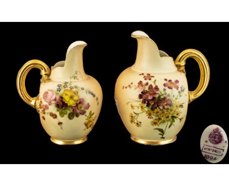 Two Royal Worcester Blush Ivory Jugs, with painted floral decoration, Regd.No.29115; 6 inches (15cms) high and 5 inches (12.5