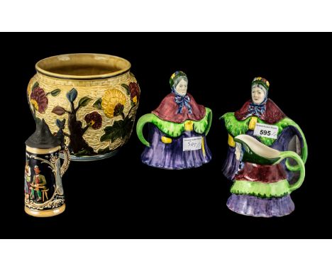 Staffordshire Pottery Three Piece Tea Set in the shape of Old Mother Riley character, with a small German stein, and an India