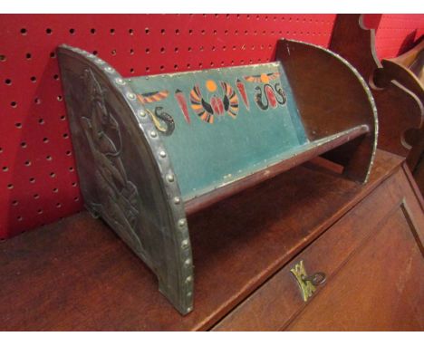 A book trough with embossed Egyptian theme ends, 30cm long 