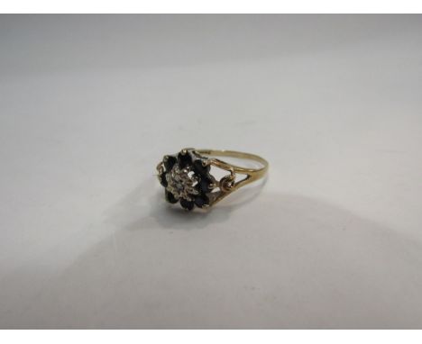 A 9ct diamond and sapphire ring 