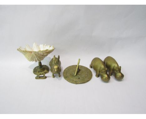 A quantity of decorative brass including clam shell pedestal bowl, animal figures and sundial 