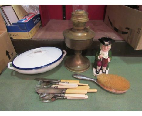 A mixed lot including plated fish knives and forks, Wade Toby jug, silver brush, Meakin tureen and an oil lamp (no shade)