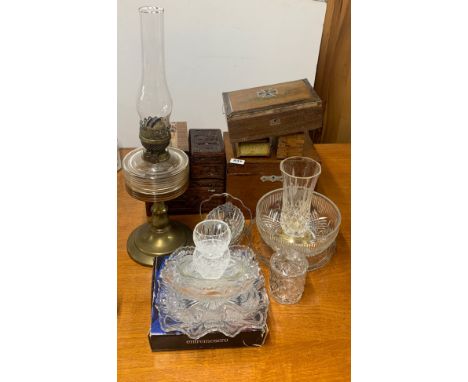 A group of Oriental and other wooden boxes, together with a quantity of glassware and an oil lamp.