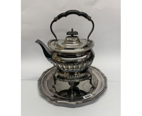 A silver plated spirit kettle with stand and tray.