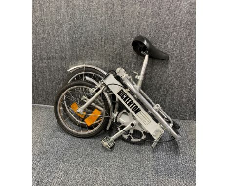 A vintage folding Bickerton aluminium bicycle with original bag.