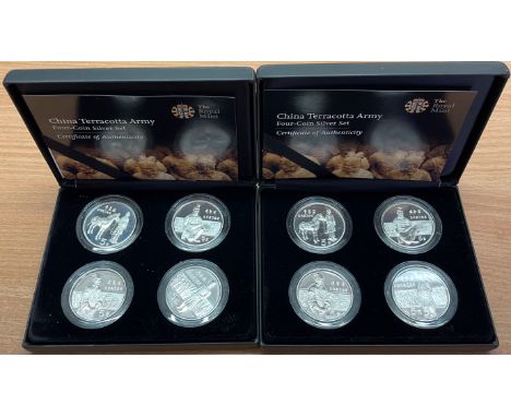 Two boxed silver 4 coin sets China terracotta army.