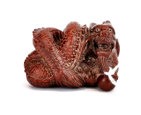 A signed Netsuke of a dragon.