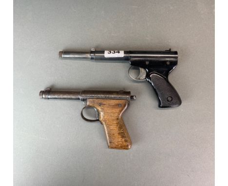 Two vintage air pistols.