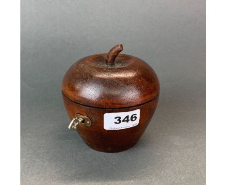 A carved wooden apple tea caddy, Dia. 11cm, D. 11cm.