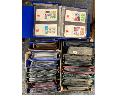 A large quantity of first day cover stamp albums.