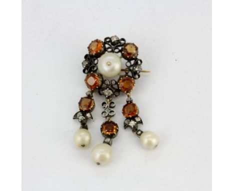 An antique yellow and white metal brooch/pendant set with natural pearls and hessonite garnets, L. 4.5cm, with The Gem &amp; 