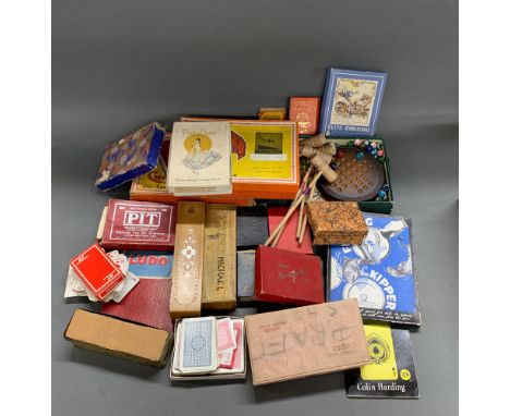 A group of vintage games and jigsaw puzzles.