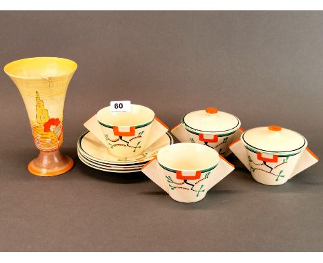 A Clarice Cliff Art Deco part soup set (A/F to some saucers) together with a Clarice Cliff vase (also A/F).