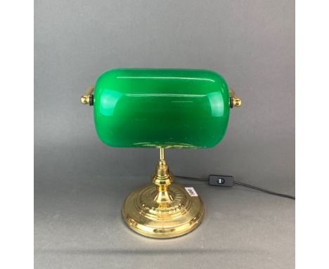 A gilt brass desk lamp.