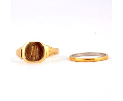 A 9ct yellow gold signet right together with a platinum band, (L &amp; R).