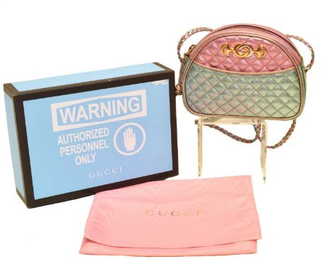 A Gucci Trapuntata Crossbody Mini Bag, the metallic pink, blue and gold laminated quilted calf leather exterior, with interla