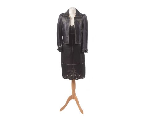 A leather set by Escada, the smooth black leather set including a mid length dress with cream stitching and cut out detail, t