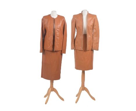 Two designer leather sets, each designed as a jacket and pencil skirt, the Escada suit with cream and brown stitch detailing 