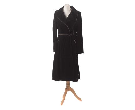 A two-in-one suede coat by Armani Jeans, the black suede full length coat with zip detailing enabling it to be worn as a shor