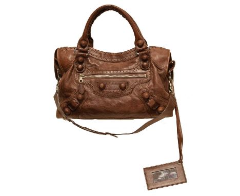 A Balenciaga Covered Giant City Bag, the brown distressed calf leather exterior with covered studs, silver tone hardware, sho